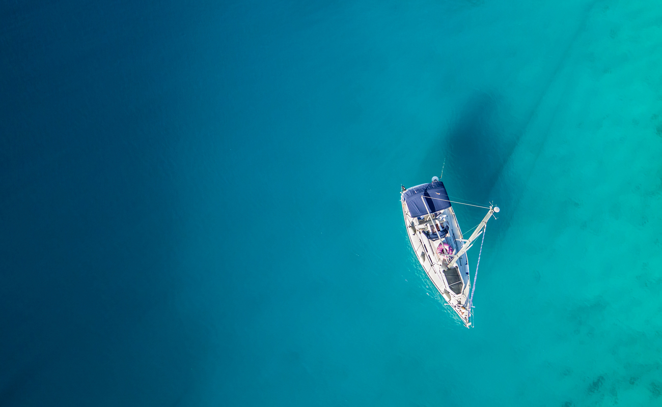 A picture of water with a boat on it